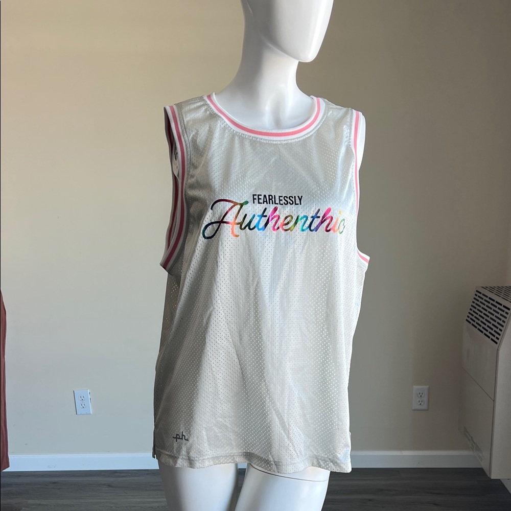 NWOT Pride-themed mesh basketball jersey .